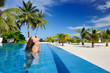 Woman at poolside