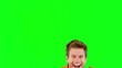 Attractive man jumping in front of the camera on green screen