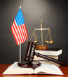 Photo: Wooden gavel, golden scales of justice and books Wooden gavel, golden scales of justice and books