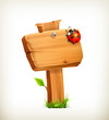 Ladybug on wooden sign