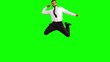 Businessman jumping and punching the air