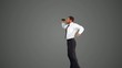 Businessman leaping and holding binoculars on grey background