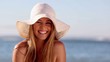 Cute woman smiling while she is on a hammock