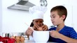 Siblings making pastry together