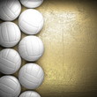 Volleyball ball and golden wall background