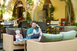 Father and daughter in outdoor restaurant