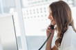 Attractive businesswoman having a phone conversation