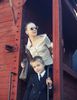 Foto: Woman with her son in the retro train Woman with her son in the retro train