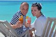 happy young couple relax and take fresh drink