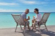 happy young couple relax and take fresh drink