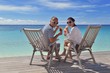 happy young couple relax and take fresh drink