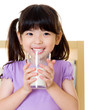 Asian girl drinking milk