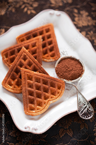 Photo: Chocolate wafers heart of oat bran, selective focus Chocolate wafers heart of oat bran, selective focus