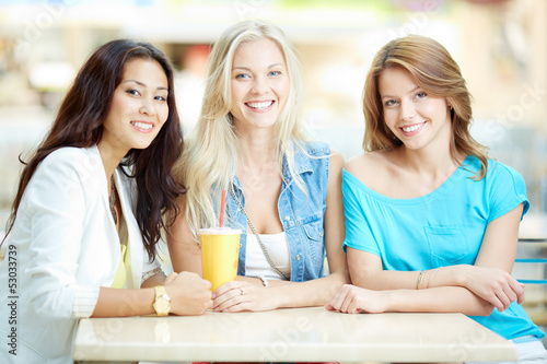 Photo: Girlfriends in cafe Girlfriends in cafe
