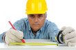 Photo: Construction Worker Measuring and Marking Construction Worker Measuring and Marking