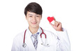 doctor holding a red love heart pillow
