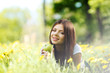 Woman with apple outdoors