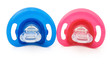 red and blue pacifiers isolated on white with clipping path
