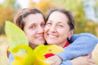 Photo: woman with adult daughter in autumn woman with adult daughter in autumn