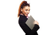 Attractive businesswoman holding a laptop