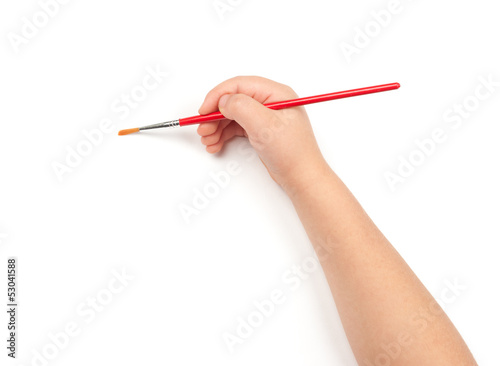 Photo: paintbrush in child hand paintbrush in child hand