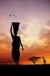African woman at sunset
