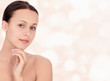 Photo: Pretty woman against abstract background Pretty woman against abstract background