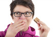 Foto: Woman eating biscuit Woman eating biscuit