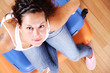 Foto: Girl sitting on suitcases Girl sitting on suitcases