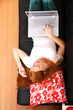 Young Redhead Girl with a Laptop
