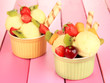 Delicious  ice cream with fruits and berries in bowl