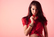 Lady in red with red feather