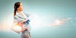 Business woman holding alarmclock