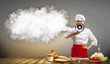 Asian female cook holding megaphone