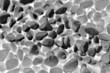 black and white photo, stones background