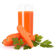 Carrot juice glass and carrot tubers