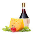 Photo: Red wine bottle, cheese and tomato still life Red wine bottle, cheese and tomato still life