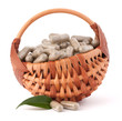 Herbal drug capsules in wicker basket. Alternative medicine conc