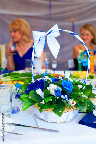 Photo: sweet candy flower basket on setting table sweet candy flower basket on setting table