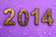 Photo: 2014 in golden numbers, on purple background 2014 in golden numbers, on purple background
