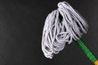 Mop for floor on dark background