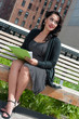 Cute business woman on High Line, NYC
