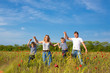 Foto: Family playing on the meadow Family playing on the meadow