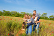 Foto: Family playing on the meadow Family playing on the meadow