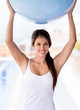 Foto : Woman with a Pilates ball Woman with a Pilates ball
