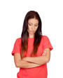 Depressed brunette girl dressed in red