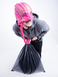 funny thief with pink tights on his face holding a stolen bag