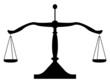 Silhouette of balancing scales.