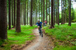 Two women riding bikes