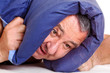Man lying in bed and can not sleep